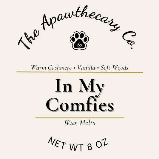 Label for 'In My Comfies' wax melts by The Apawthecary Co. with a paw print logo.