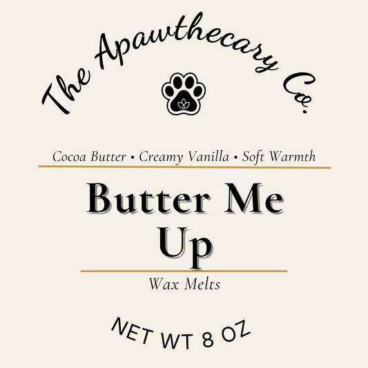 Label for 'Butter Me Up' wax melts by The Apawthecary Co. with paw print logo.