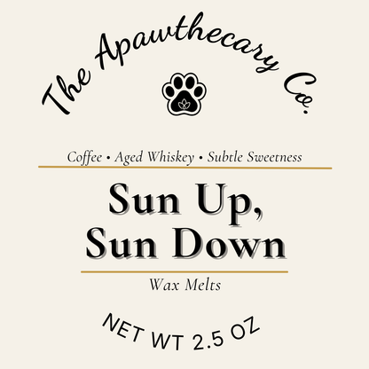 Label for 'Sun Up, Sun Down' wax melts by The Apawthecary Co. on a beige background.