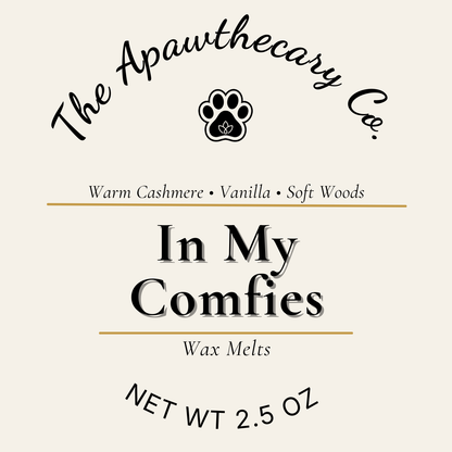 Label for 'In My Comfies' wax melts by The Apawthecary Co. with a paw print logo.