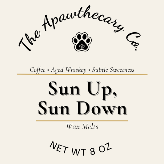 Label for 'Sun Up, Sun Down' wax melts by The Apawthecary Co. on a beige background.