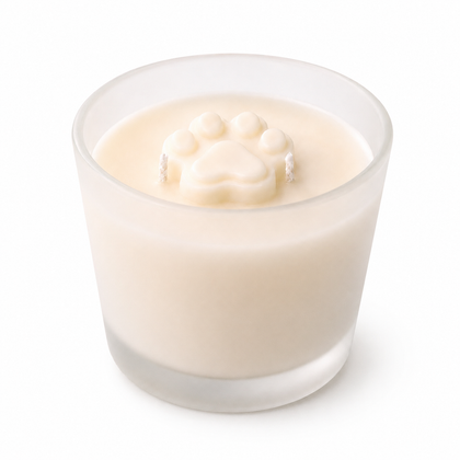 Glass container with a creamy substance and a paw print on a white background