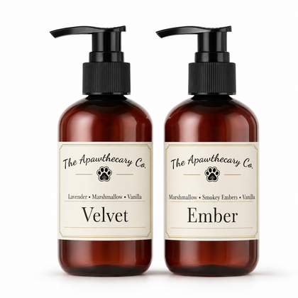 Two amber pump bottles with cream labels from The Apawthecary Co., labeled Velvet and Ember, on a white background.