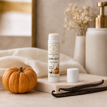 Low-Key Lip Balm – Vanilla Pumpkin — vanilla and pumpkin lip balm with cap removed