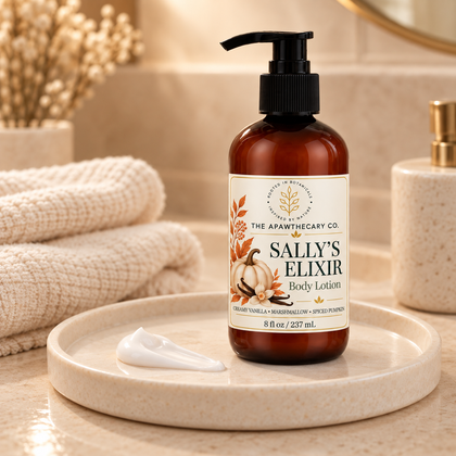 Sally’s Elixir body lotion beside a lotion dollop and texture smear
