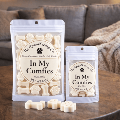 In My Comfies soy & coconut wax melts in various sizes displayed on a wooden table.