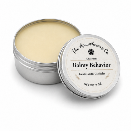 Open 2 oz tin of fragrance-free Balmy Behavior multi-use balm with the labeled lid beside it.