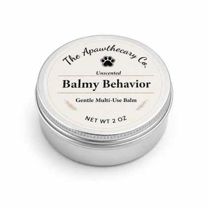 A round silver metal tin of 'The Apawthecary Co.'s Unscented Balmy Behavior Gentle Multi-Use Balm, shown on a clean white background.