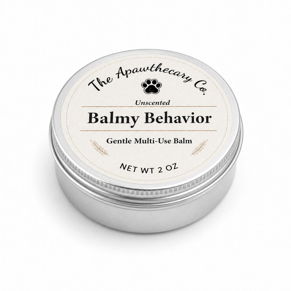 A round silver metal tin of 'The Apawthecary Co.'s Unscented Balmy Behavior Gentle Multi-Use Balm, shown on a clean white background.