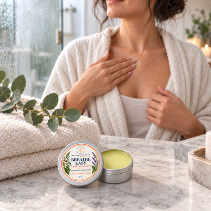 Palm-sized Breathe Easy 2 oz aromatic balm tin in a realistic chest-application scene.