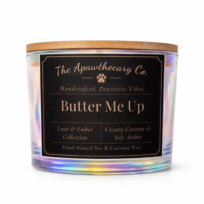 Candle with a label from The Apothecary Co. on a white background