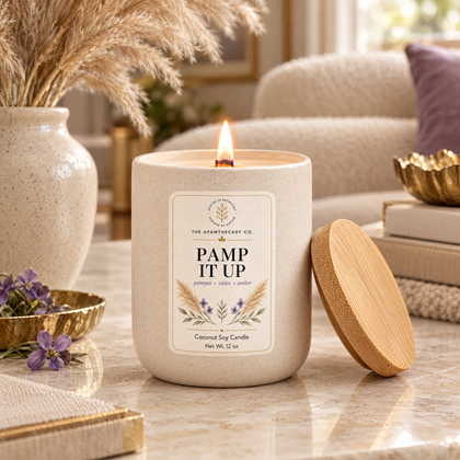 Pamp It Up candle in an elevated neutral living room