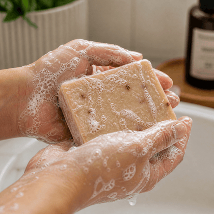 Cherry Picked - Standard Cold Process Soap - Cherry & Almond Scented, showing hands lathering the soap in bubbles.