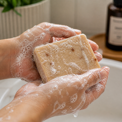 Cherry Picked - Standard Cold Process Soap - Cherry & Almond Scented, showing hands lathering the soap in bubbles.