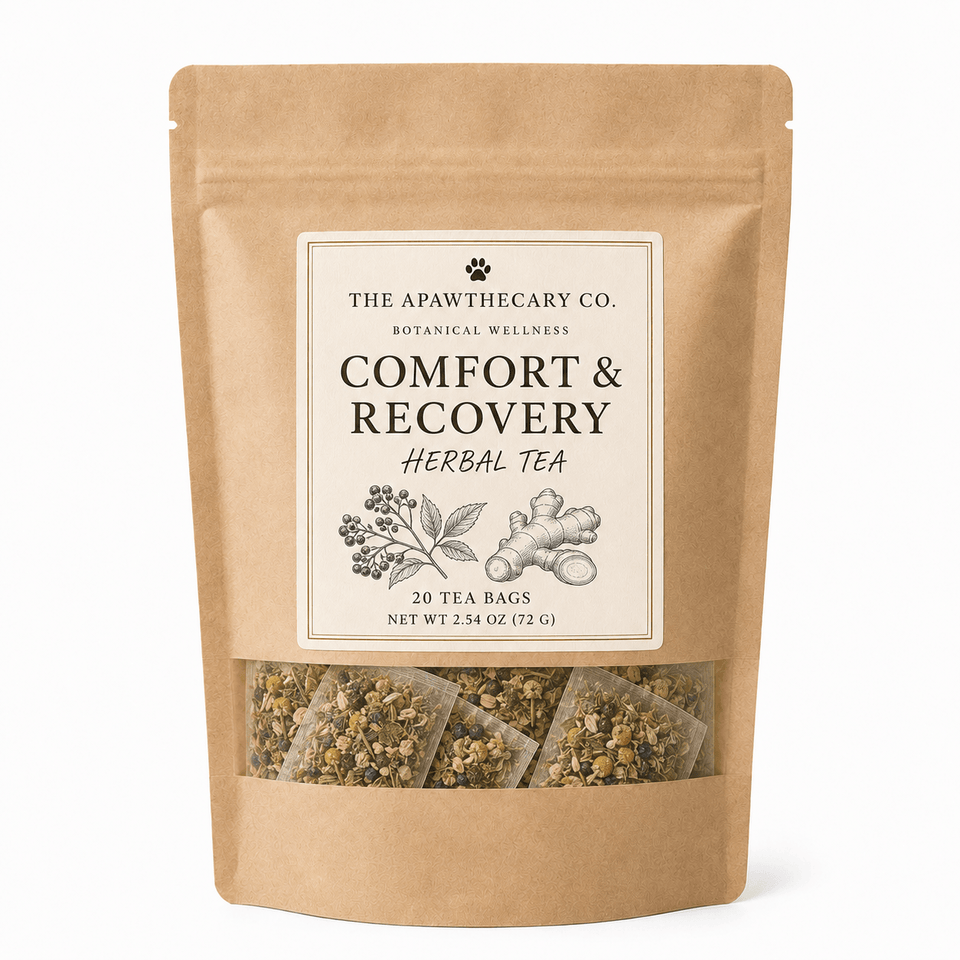 A stand-up kraft paper pouch of The Apawthecary Co. Comfort & Recovery Herbal Tea, featuring a cream label with botanical illustrations and a clear window at the bottom showing the herbal tea bags inside.