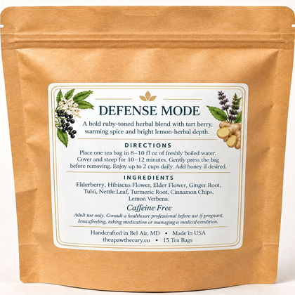 Back label of Defense Mode herbal tea with revised ingredients, directions, safety guidance, and 15 tea bags.
