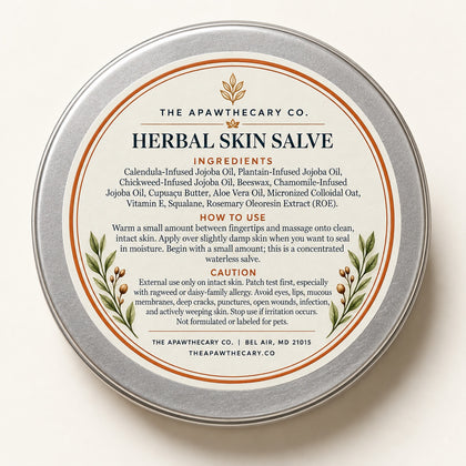 Herbal Skin Salve 2 oz tin with ingredients, directions, and caution back label.
