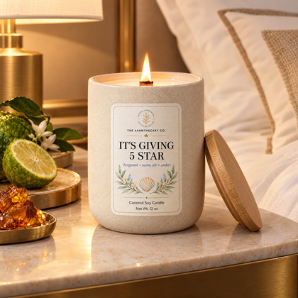 It's Giving 5 Star candle in a luxury hotel nightstand setting