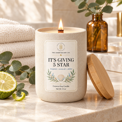 It's Giving 5 Star candle in an upscale spa bathroom setting