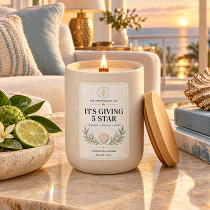 It's Giving 5 Star candle in an elegant coastal hotel living room