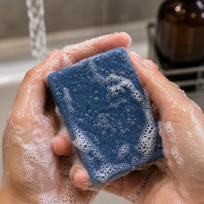 Hands lathering Jam Packed - Standard Cold Process Soap - Blueberry Scented under running water.