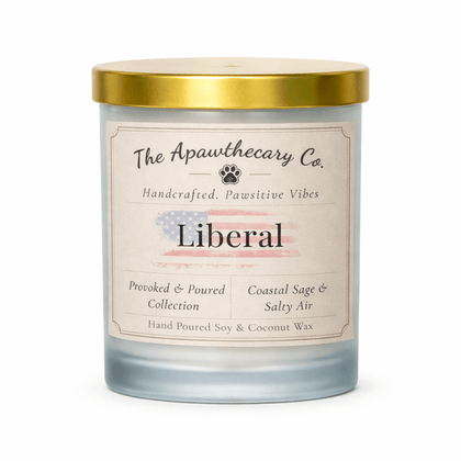 Candle with a label from The Apawthecary Co. on a white background