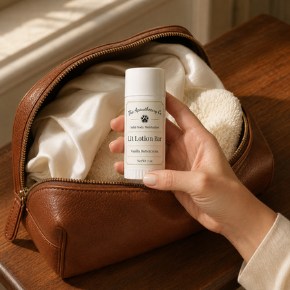 Hand holding a Lit Lotion Bar above an open brown travel pouch.