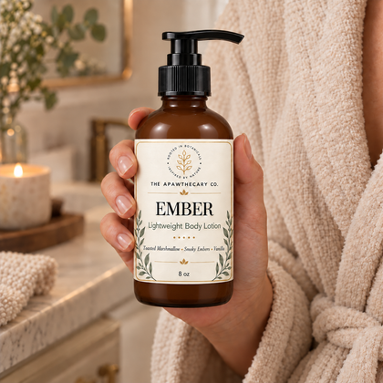 Ember body lotion held to show bottle size