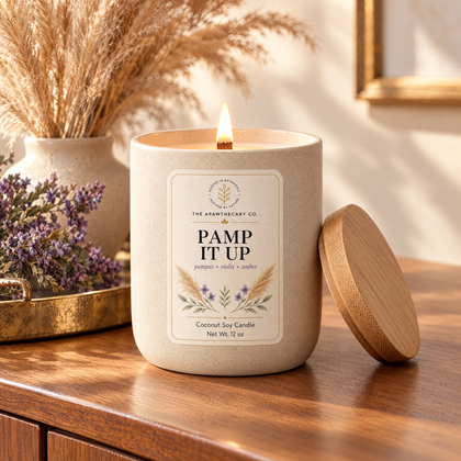 Pamp It Up candle in a modern pampas entryway setting