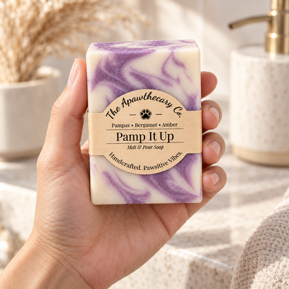 Pamp It Up soap held in hand in a warm neutral bathroom