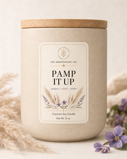 Pamp It Up candle product image with pampas and violet background