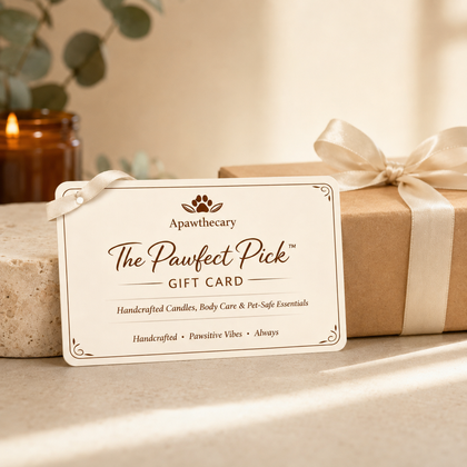 The Pawfect Pick digital gift card beside a kraft gift box with ivory ribbon in warm natural light.