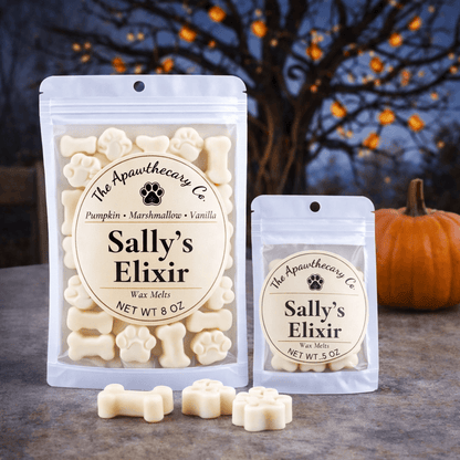 Sally's Elixir wax melts in pumpkin, marshmallow, and vanilla scents, featuring a paw print design, soy & coconut wax melts.