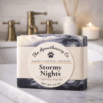 Stormy Nights Cold Process Soap - Calming Soap bar with lavender and fresh herbs on a marble countertop.