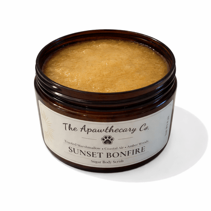 Sunset Bonfire Sugar Scrub in a jar, featuring toasted marshmallow and amber woods fragrance.