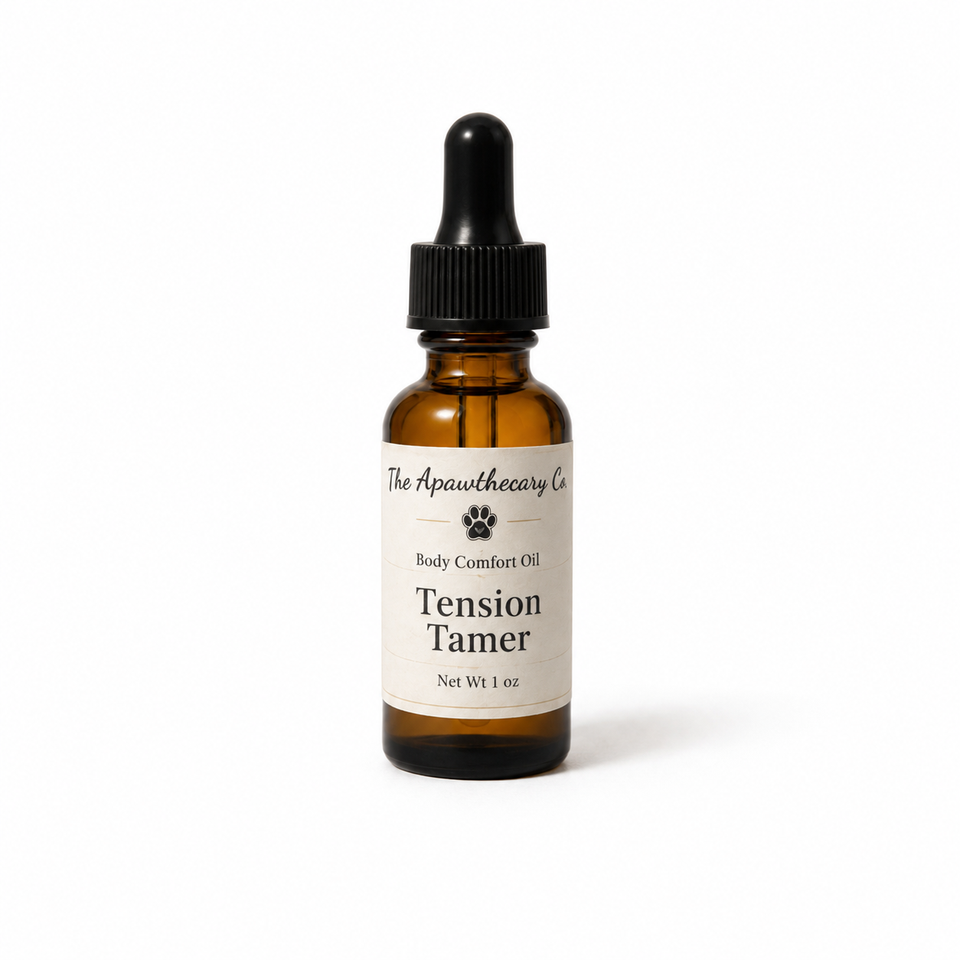 One-ounce amber dropper bottle of Tension Tamer body comfort oil on a white background.