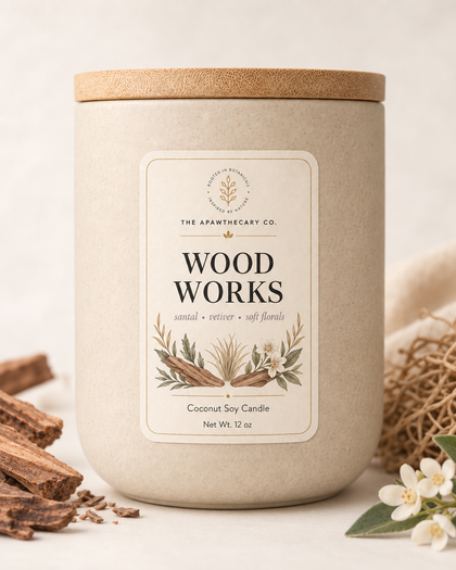 Wood Works candle product image with woody botanical background